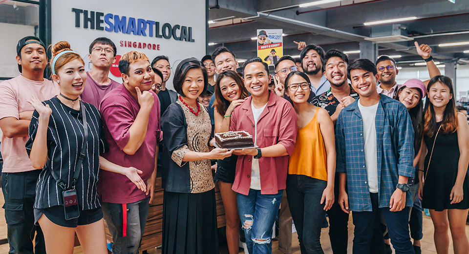 Group photo of Senior Minister of State Sim Ann with the cast and crew of FilterSpell from TheSmartLocal and Night Owl Cinematics.