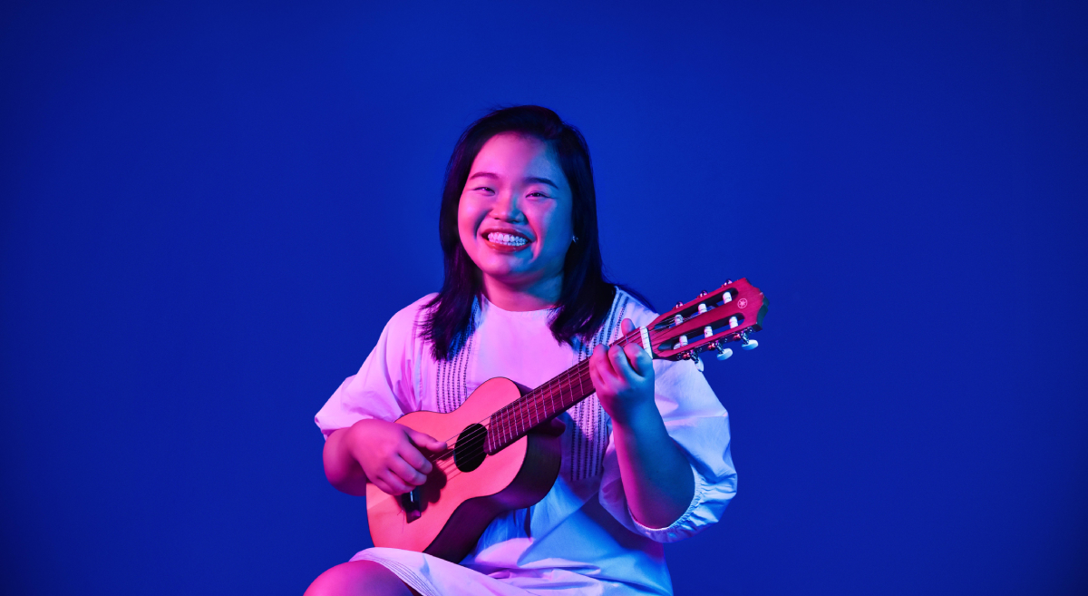 A seated portrait of local musician Vivien Yap