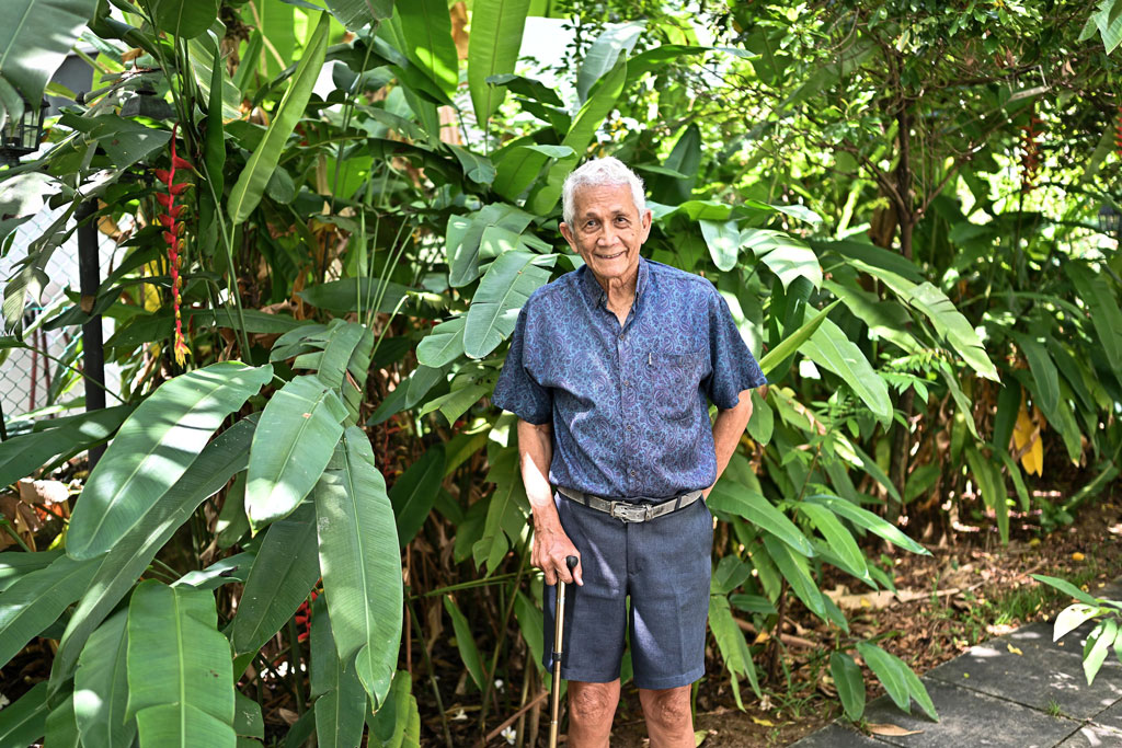 Edmund Rodrigues outside his house