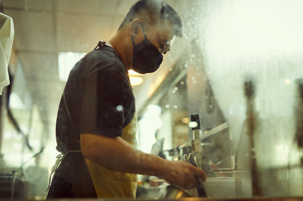 Kok Keong preparing a bowl of yong tau foo, a traditional Hakka dish. He made the switch from cooking French food to serving Hakka fare as he felt that the culture’s cuisine was underrepresented in Singapore.